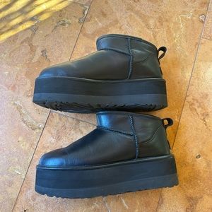 Mini ankle platform black leather UGG boots need a new home.